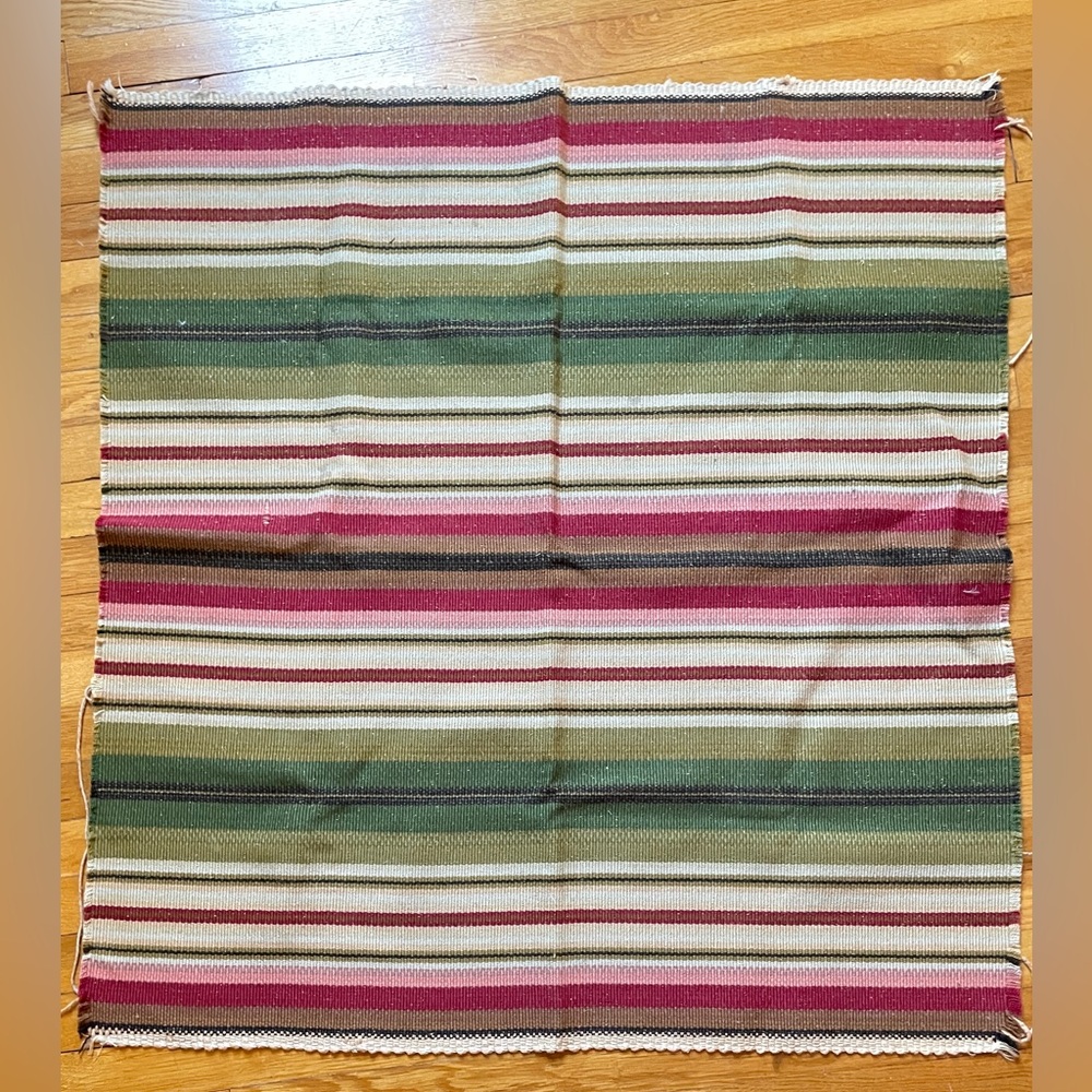 Hand made rug from South America. Hand woven stripes